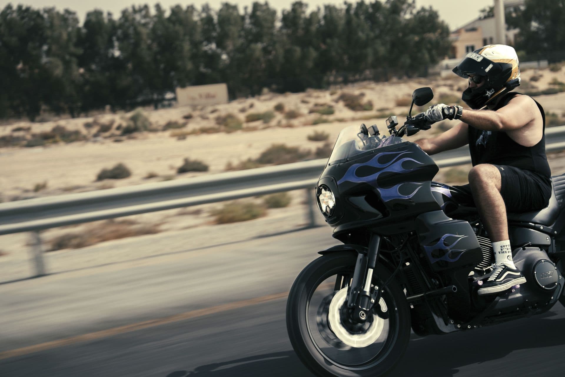 A rider in a helmet on the highway