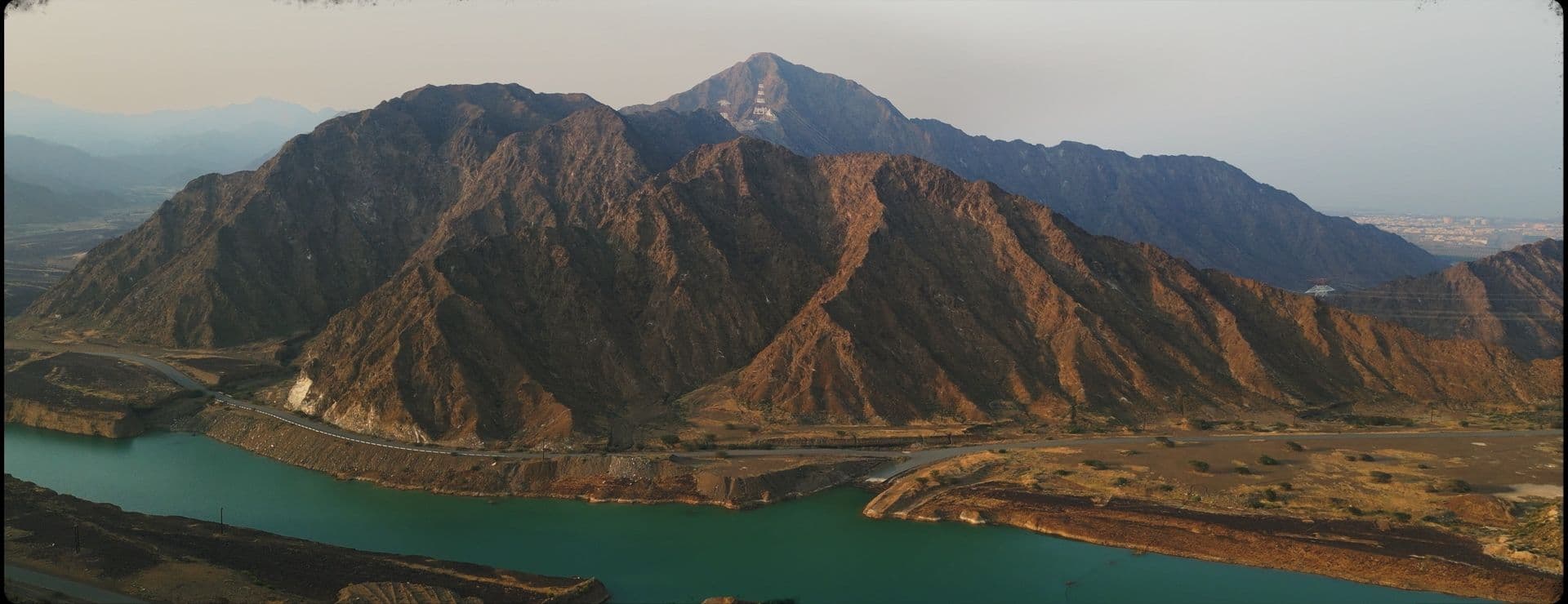 Mountains and a green wadi from the air